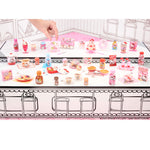 Twelve Hello Kitty food to collect