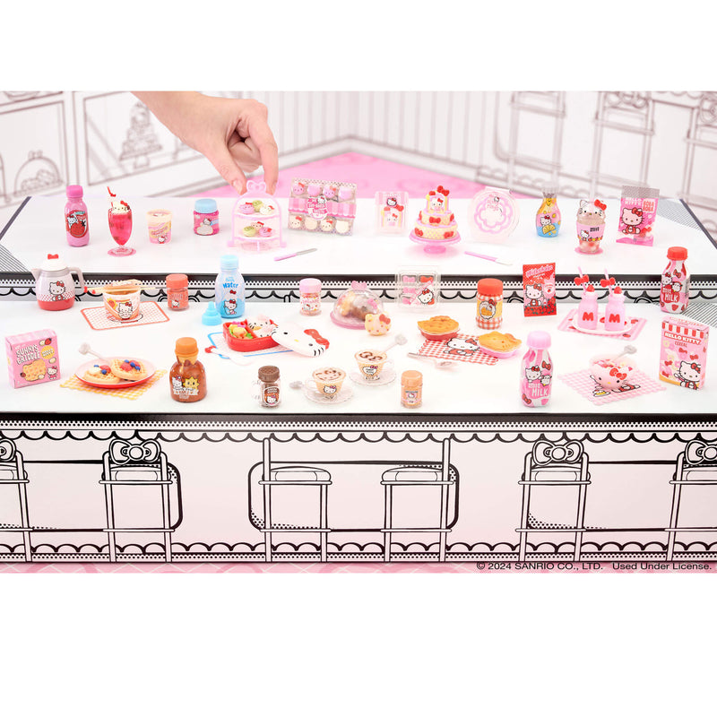 Twelve Hello Kitty food to collect