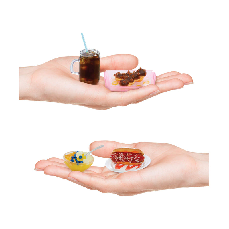 four minis in palm of hands