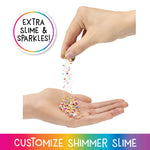 Hand pouring colorful glitter into another hand with text 'Extra Slime & Sparkles' and 'Customize Shimmer Slime'.