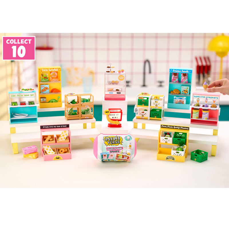 Collection of all ten Mini Spaces Furniture on a kitchen counter with a pink background