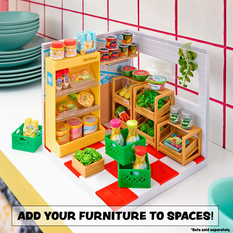 Miniature set with furniture and food items on a checkered floor.
