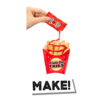 Red container of Crinkle Cut Fries with a hand holding a packet above it, on a white background.