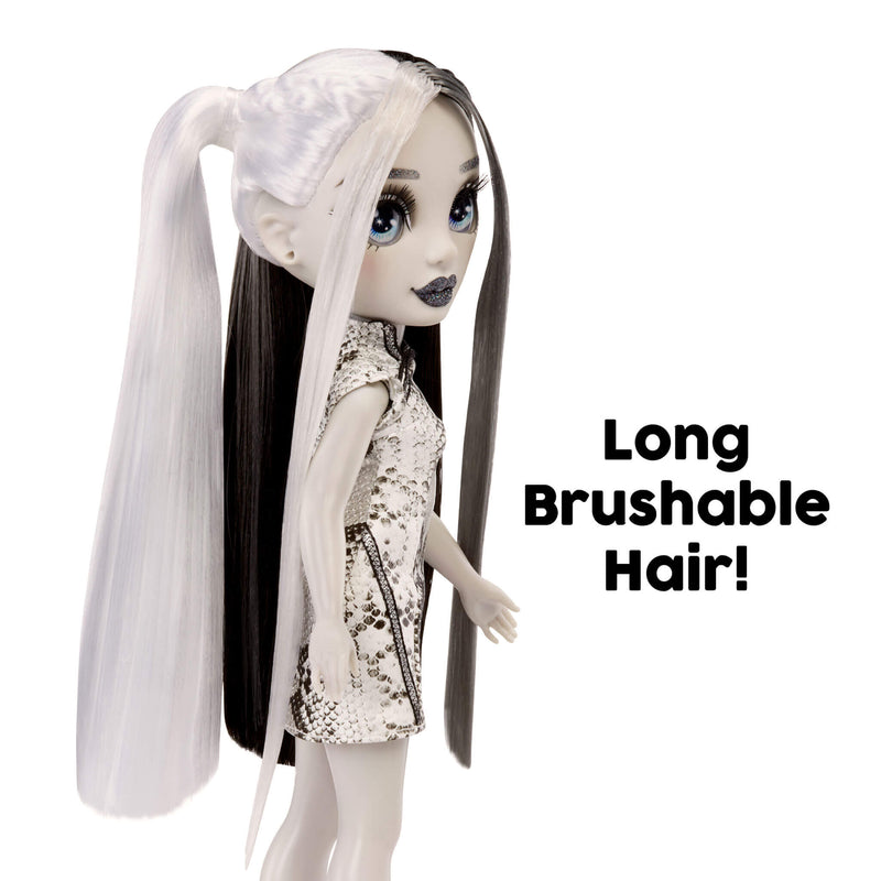 Doll with long brushable hair and sequin outfit on a white background