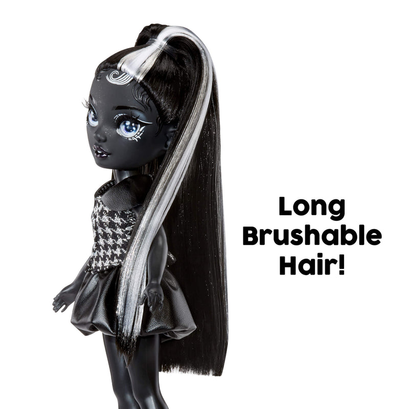 Black doll with long brushable hair and a houndstooth dress on a white background.