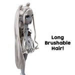 Doll with long brushable hair on a white background