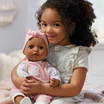 Girl holding Baby Doll Harper