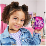 Girl hold Pop Star packaging ball in a room