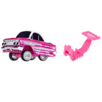 A pink toy car with chrome details shown next to a small pink accessory on a plain white background.