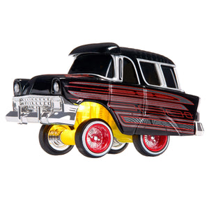 A miniature classic car toy with a glossy black body, red and gray graphic stripes, bright yellow underneath, and red-spoked wheels, shown on a plain white background.