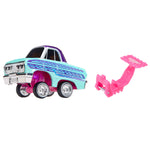 A toy car with a light blue body, purple and blue stripes, and a separate pink accessory piece, shown on a plain white background. 
