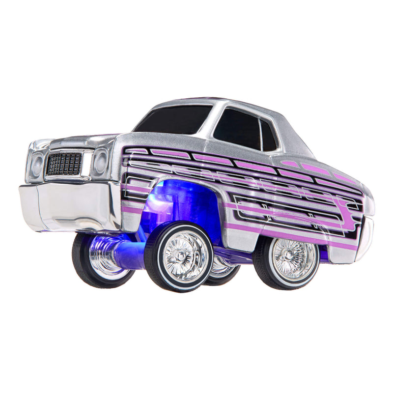 A toy car with purple and pink striping, blue glow underneath, and a silver body, isolated on a white background.