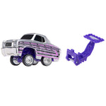 A toy car with a silver body, purple and purple stripes, and a separate purple hitch accessory, shown on a plain white background.