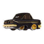 A die-cast metal model car of a classic 1961Chevrolet Impala, featuring a black body with gold accents, gold spoked wheels with white-wall tires, with ‘CarTuned’ on back window shown on a white background.