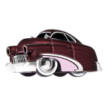 A toy metal car with a burgundy body, white trim and a pink fender with black, white wall tires, shown on a plain white background.