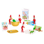 Four Mini Elf on the Shelf Elves - two white skinned, two dark skinned, yellow bowl, gold platter, tree mold and various mini packages on a white background