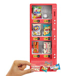 Red toy vending machine with various snack packages on a white background