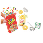 Fruity Pebbles cereal box, Dole pineapple juice, and Boursin cheese on a white background