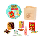 Round packaging ball with Fruity Pebbles and Dole Pineapple branding -in front is various small items - Meow Mix - Fruity Pebbles - Ice cream bars- a drink and a shopping bag with 'HAVE A NICE DAY'
