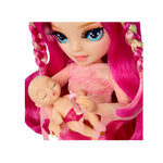 Close up of doll holding baby on a white background