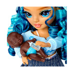 Close up of doll holding baby on a white background