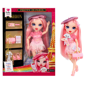 Toy doll with pink hair and outfit, standing next to its packaging featuring the Eiffel Tower.