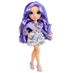 Doll with purple hair and outfit on a white background