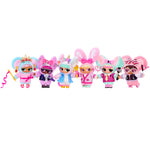 Six colorful dolls with ears on a white background