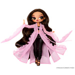 Doll with long brown hair with long pink cover up and black pants on a white background
