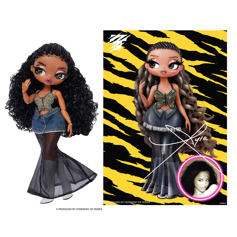 Tyla fashion doll standing next to packaging which features the doll, picture of Tyla on a tiger striped background.