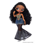 Fashion doll is waving with the right hand, has long curly black hair, blue and gold butterfly top, denim skirt with sheer lining to the ground, white boots on a white back ground.