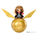 Hermione on a golden ball with wings, inspired by Harry Potter.