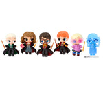 Set of six Harry Potter-themed figurines on a white background