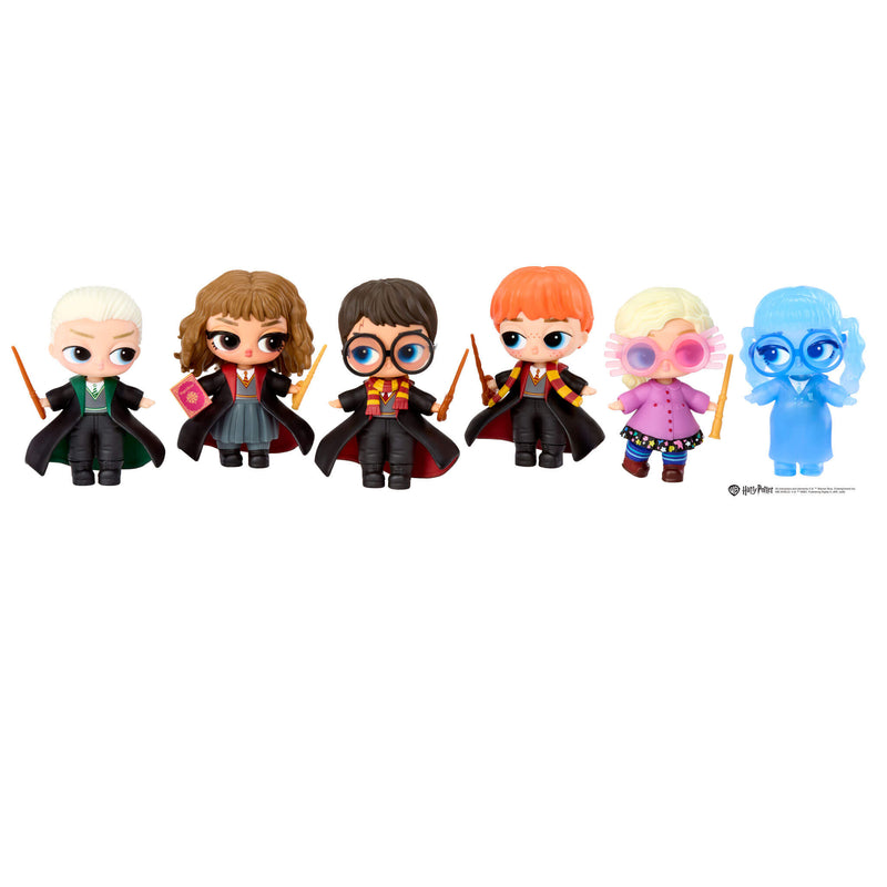 Set of six Harry Potter-themed figurines on a white background