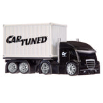 A toy semi-truck with a black cab and a white shipping container carrying the 'Car Tuned' logo, shown on a plain white background.