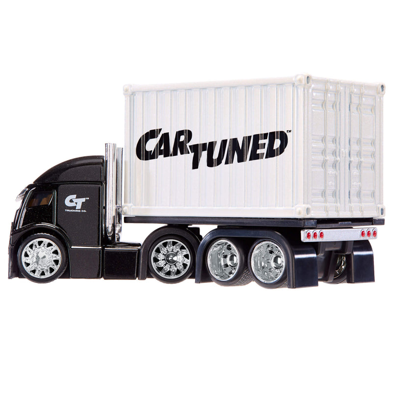 A toy semi-truck with a black cab and a white container trailer featuring the 'CAR-TUNED' logo, shown against a plain white background.