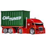A toy semi-truck with a red cab and a green container carrying the words 'CAR TUNED' in white, shown on a plain white background.