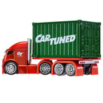 A toy model of a red semi-truck carrying a green shipping container with 'CAR TUNED' written in white on the side, isolated on a white background.