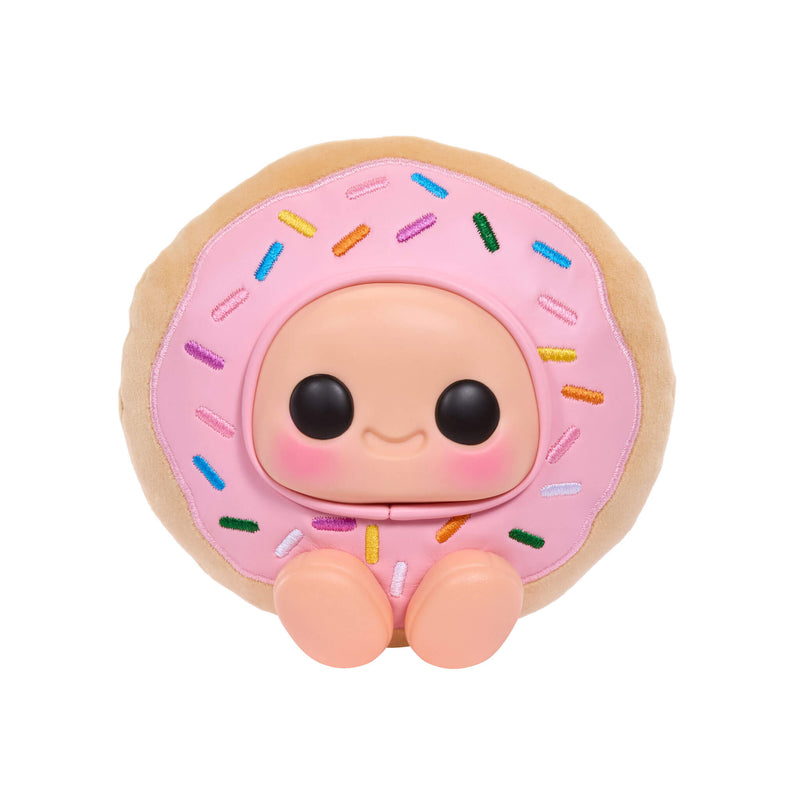 Donut-shaped toy with a face on a white background