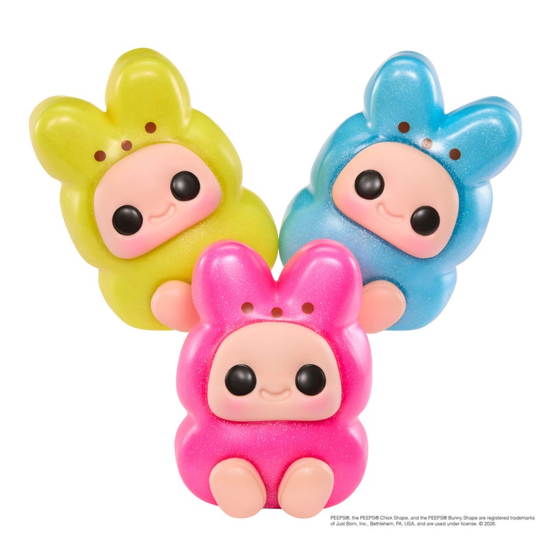 Three Peeps-like characters in pink, green, and blue on a white background.