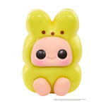 Cute yellow character with large black eyes and pink cheeks on a white background