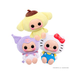 Three colorful plush Hello Kitty toys with different outfits on a white background