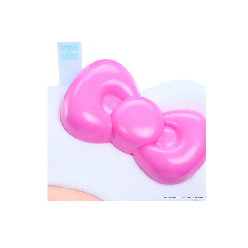 Pink bow-shaped object on a white background