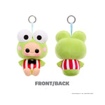 Green plush toy with a black bow tie on a white background