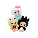 Three Hello Kitty character plush toys on a white background