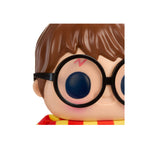 Close-up of a toy figure with glasses and a striped scarf on a white background