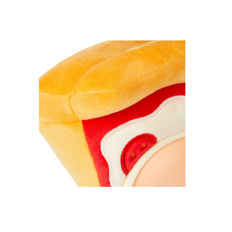 Close up of a soft looking brown pizza crust with red sauce, cheese and pepperoni. 