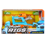 Packaging with blue and orange toy semi car hauler with two smaller toy cars, one blue, one orange. Upper left states ‘ 2 CARS INCLUDED’ bottom right states ‘CUSTOM CAR CARRIER’ with ‘CARTUNED RIG$' logo.