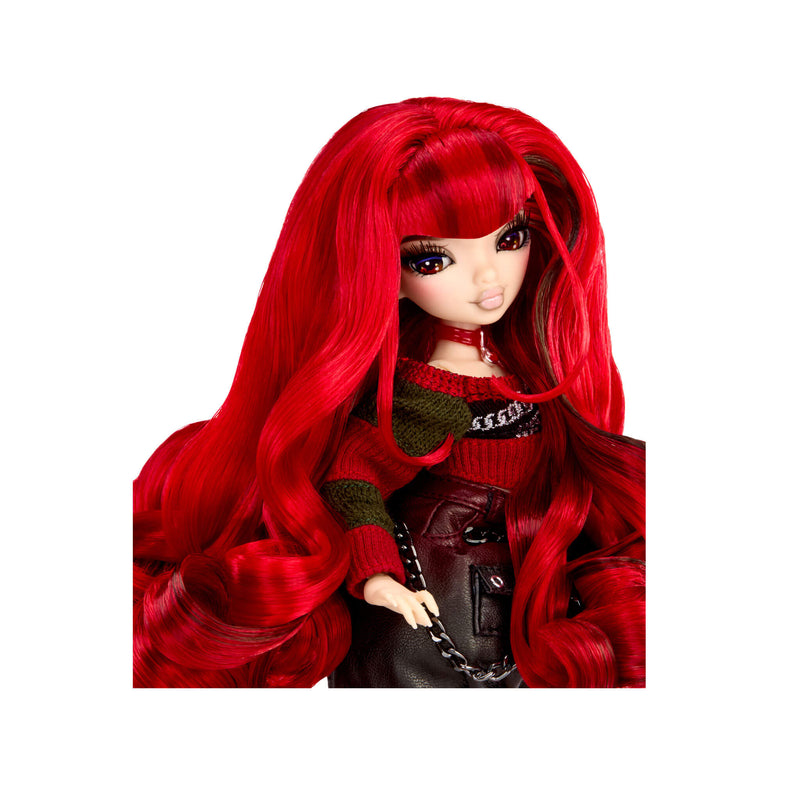 Doll with red choker, black and red sweater with long red hair on a white background