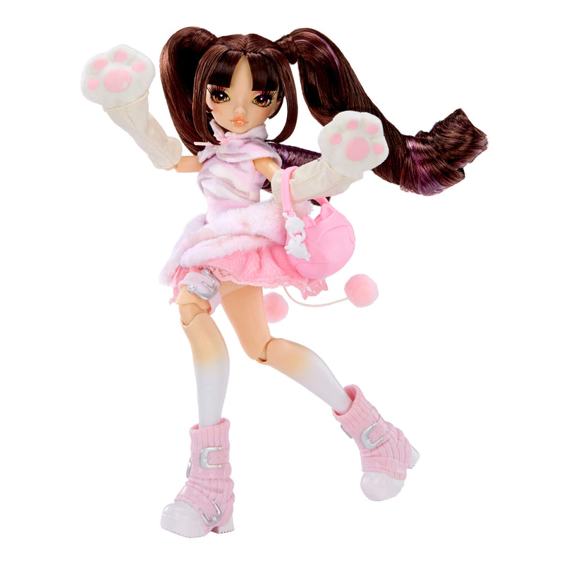Fashion doll dressed in pink on a white background